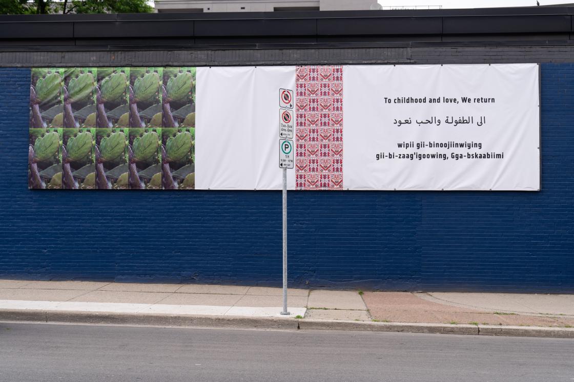 This image is the billboard for Wanda Nanabush's 'We Return', on the Cannon Project Wall from June 20, 2025 to June 20, 2026.